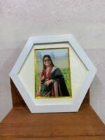 white 5x7 round frame with photo